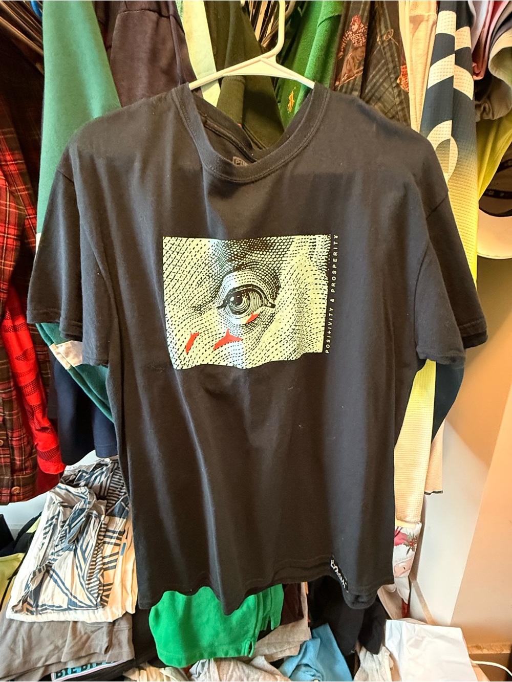 Pink Dolphin Black Graphic Tee with Green Print and Red Accents